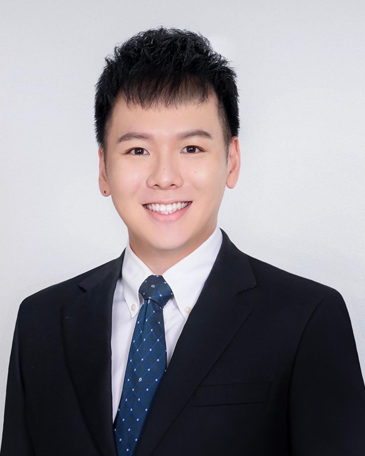 Alvin Ang, property strategy advisor in Singapore, with an open, approachable expression.